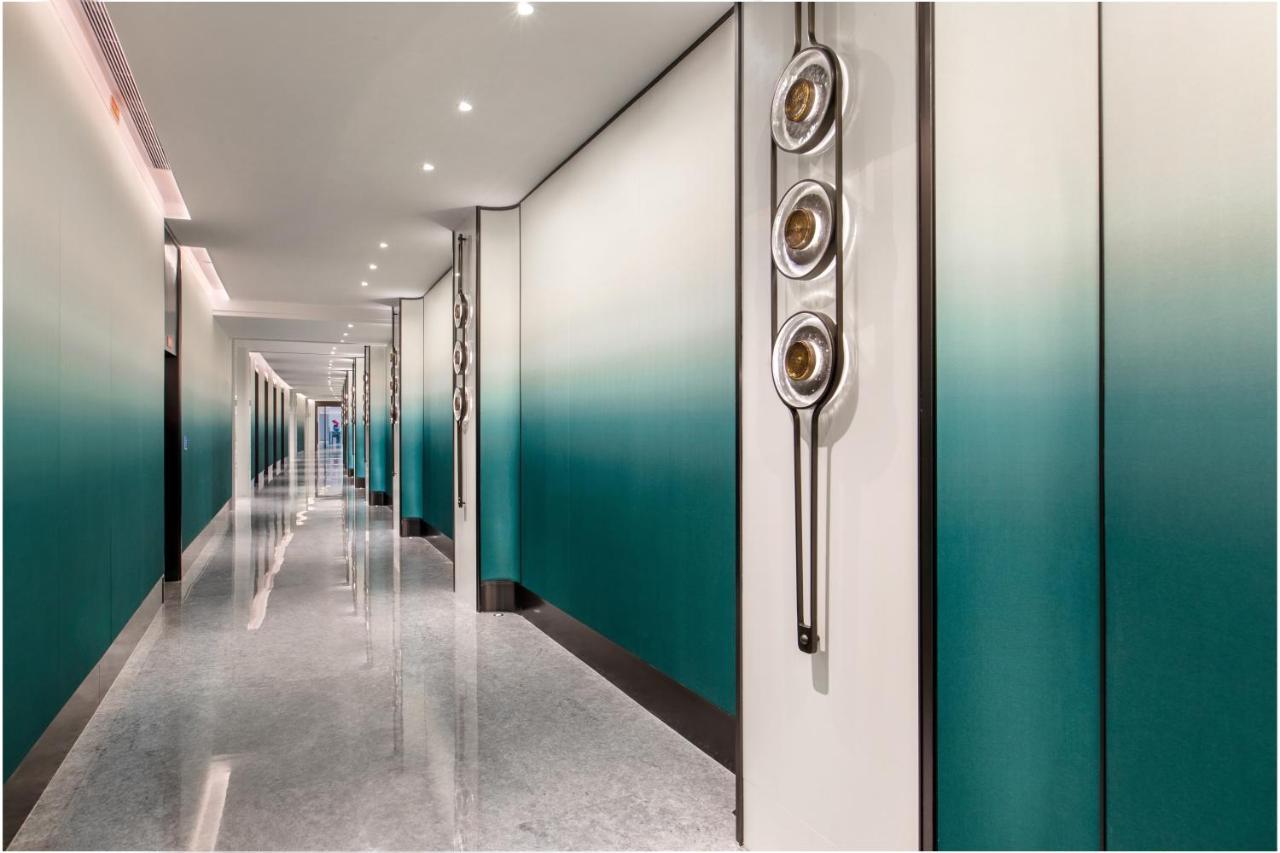 Xiamen International Seaside Hotel -Hotel Corridor Leads To The Stone Exhibition Hall Zewnętrze zdjęcie